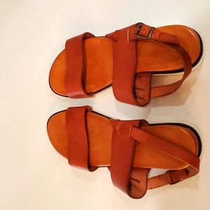 Great pair of sandles. True leather with great cushion. Brown leather